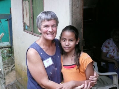 Margaret Storey with a sponsored child