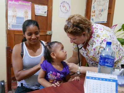 Dr Sandra treating a girl