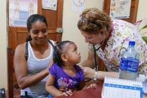 Dr Sandra treating a girl