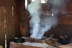 Traditional wood stove with lots of smoke