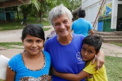 Margaret Storey with two sponsored children