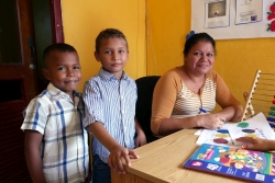 The psychologist at the Orphanage with two boys