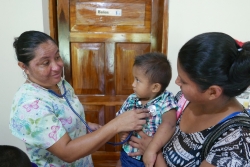 Nurse Aleida with a young patient