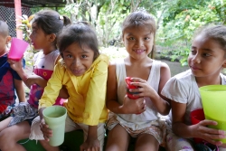 Children with their glasses of high-vitamin milk