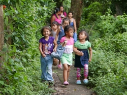 Children walking to the Feeding Programme