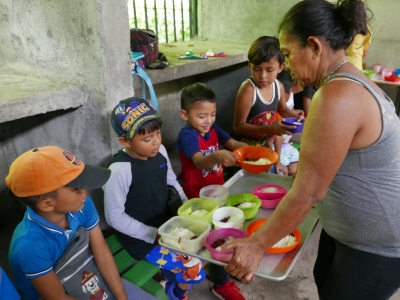 The children receiving a meal