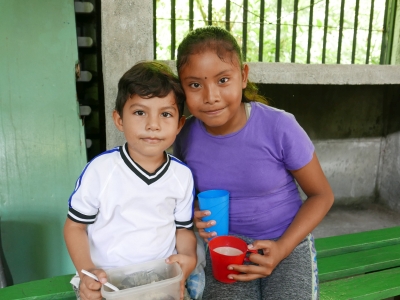 Children enjoying their milk